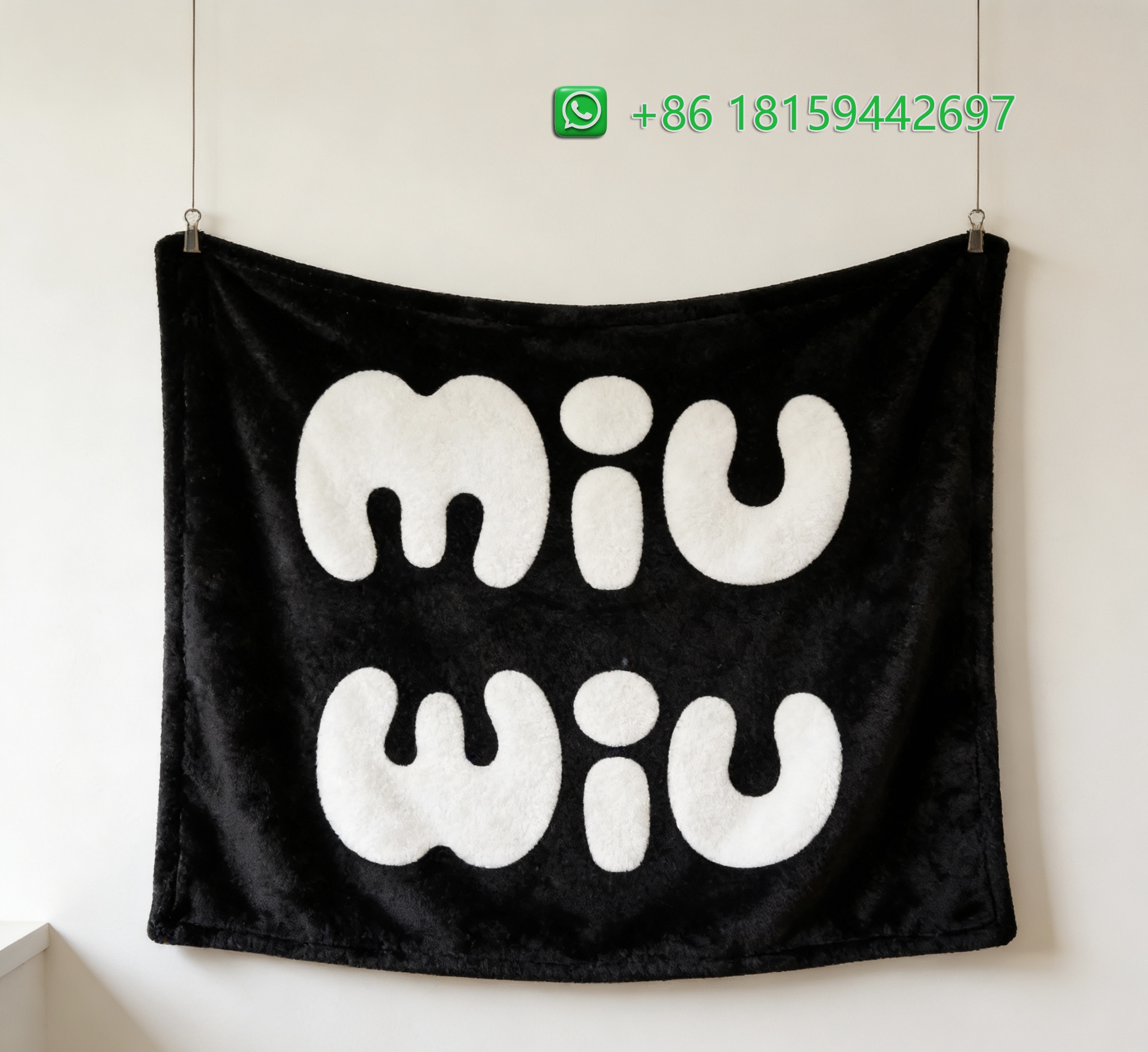 Miumiu Throw Blankets